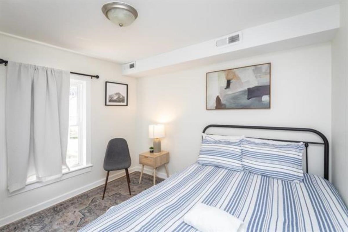 600 East Main Street Waynesboro, VA 22980 - Photo 11 of 33 a bedroom with a bed and a window