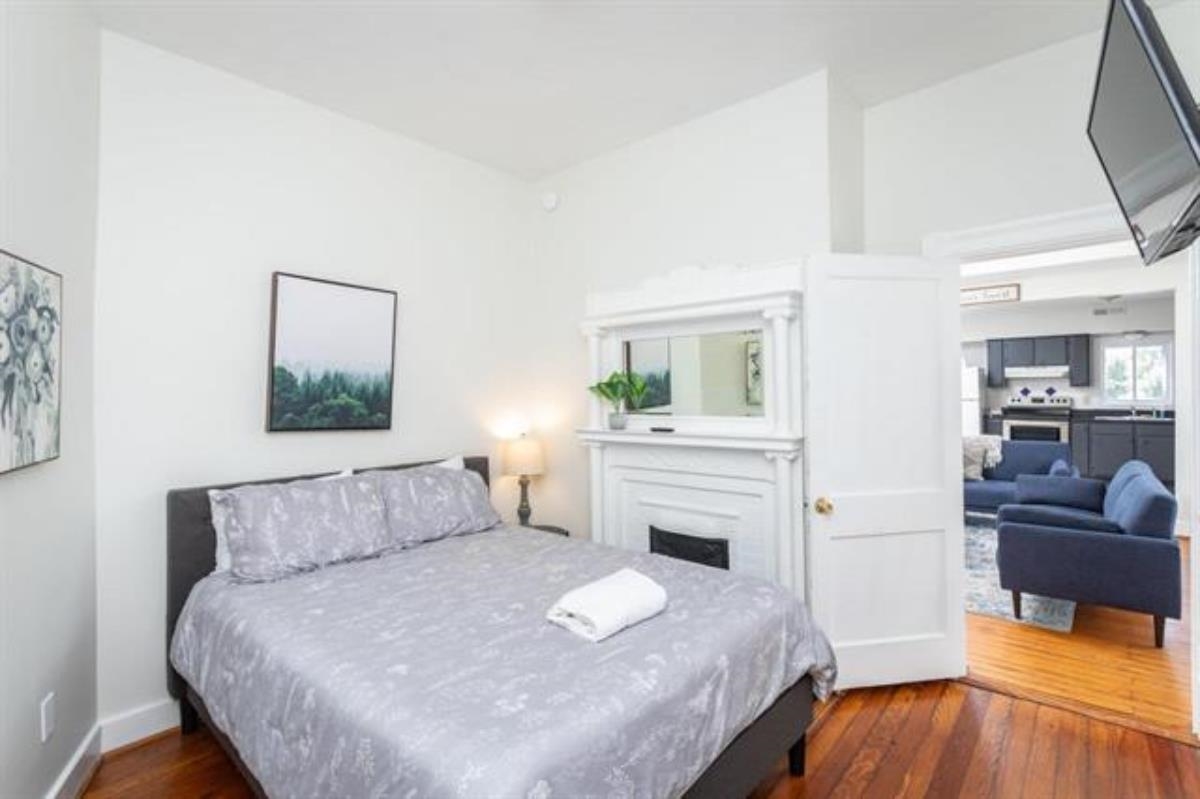 600 East Main Street Waynesboro, VA 22980 - Photo 17 of 33 a bedroom with a bed and a couch