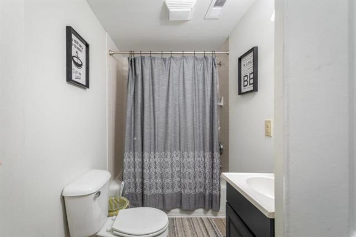 600 East Main Street Waynesboro, VA 22980 - Photo 20 of 33 a white toilet sitting next to a bathroom sink