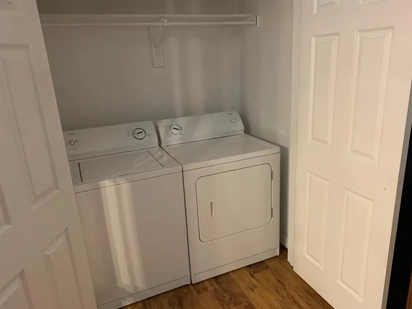 a utility room with dryer and washer