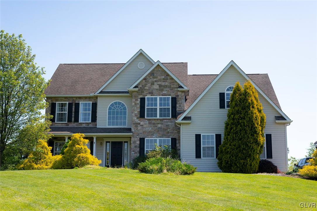 778 Bushkill Center Road Nazareth, PA 18064 - Photo 1 of 27 a view of a yard in front of a house