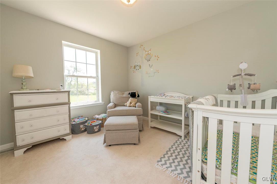 778 Bushkill Center Road Nazareth, PA 18064 - Photo 24 of 27 a bedroom with furniture and a window