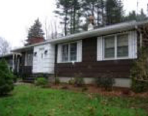 97 Wheeler Road Monroe, CT 06468 - Photo 1 of 1 a front view of a house with a yard