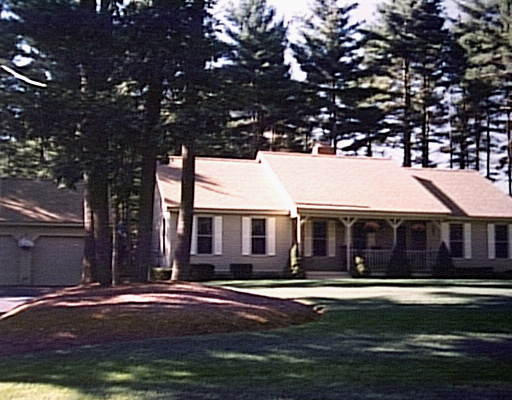 14 Pheasant Ridge Road Townsend, MA 01469 - Photo 1 of 1 a front view of a house with a yard swimming pool and a yard