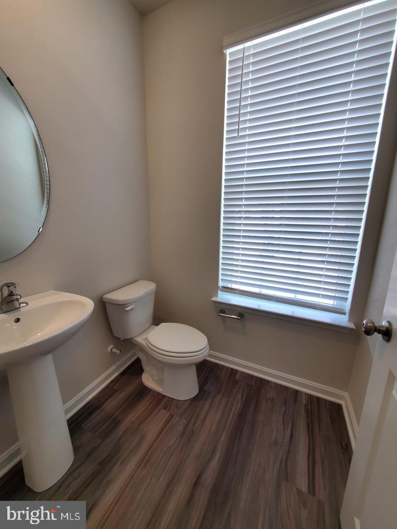 1992 Fauna Drive Frederick, MD 21702 - Photo 12 of 24 a bathroom with a toilet a sink and a window
