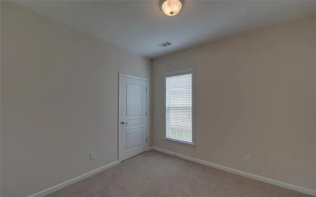 wooden floor and window in a room