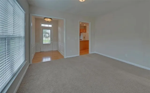 an empty room with windows