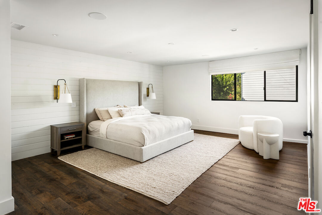 17003 Rancho Street Encino, CA 91316 - Photo 19 of 29 a bedroom with a bed and a couch