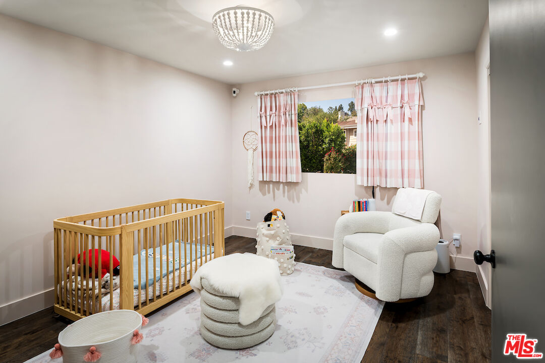 17003 Rancho Street Encino, CA 91316 - Photo 22 of 29 a bedroom with furniture and a bed