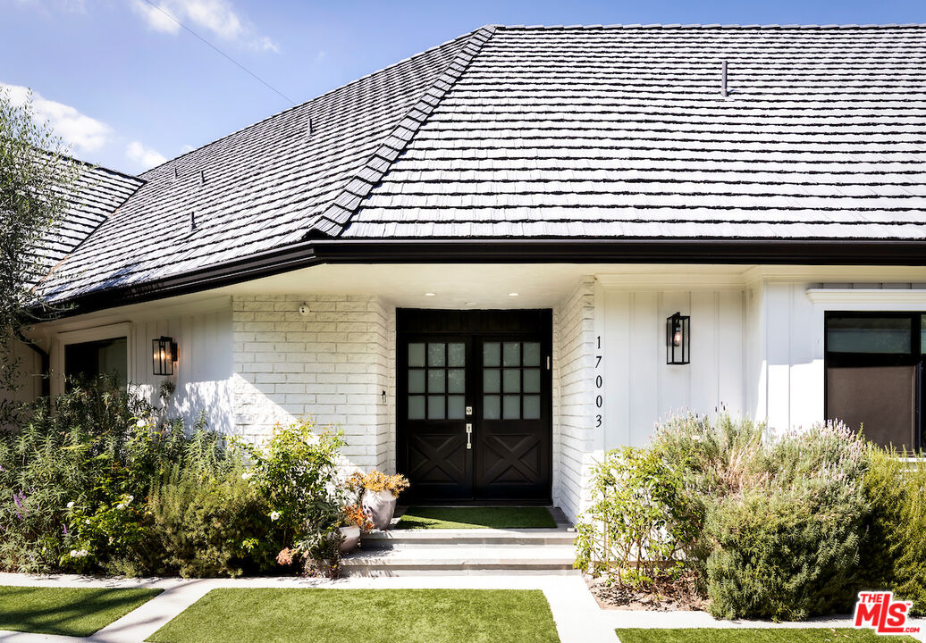 17003 Rancho Street Encino, CA 91316 - Photo 4 of 29 a front view of a house