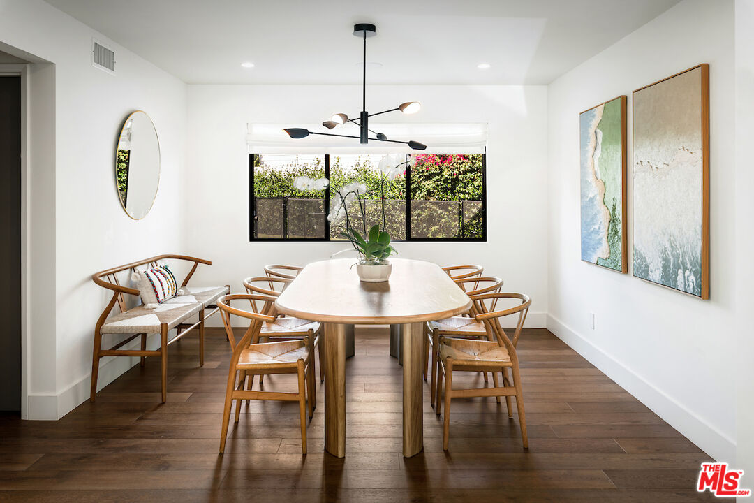 17003 Rancho Street Encino, CA 91316 - Photo 8 of 29 a view of a dining room with furniture window and wooden floor