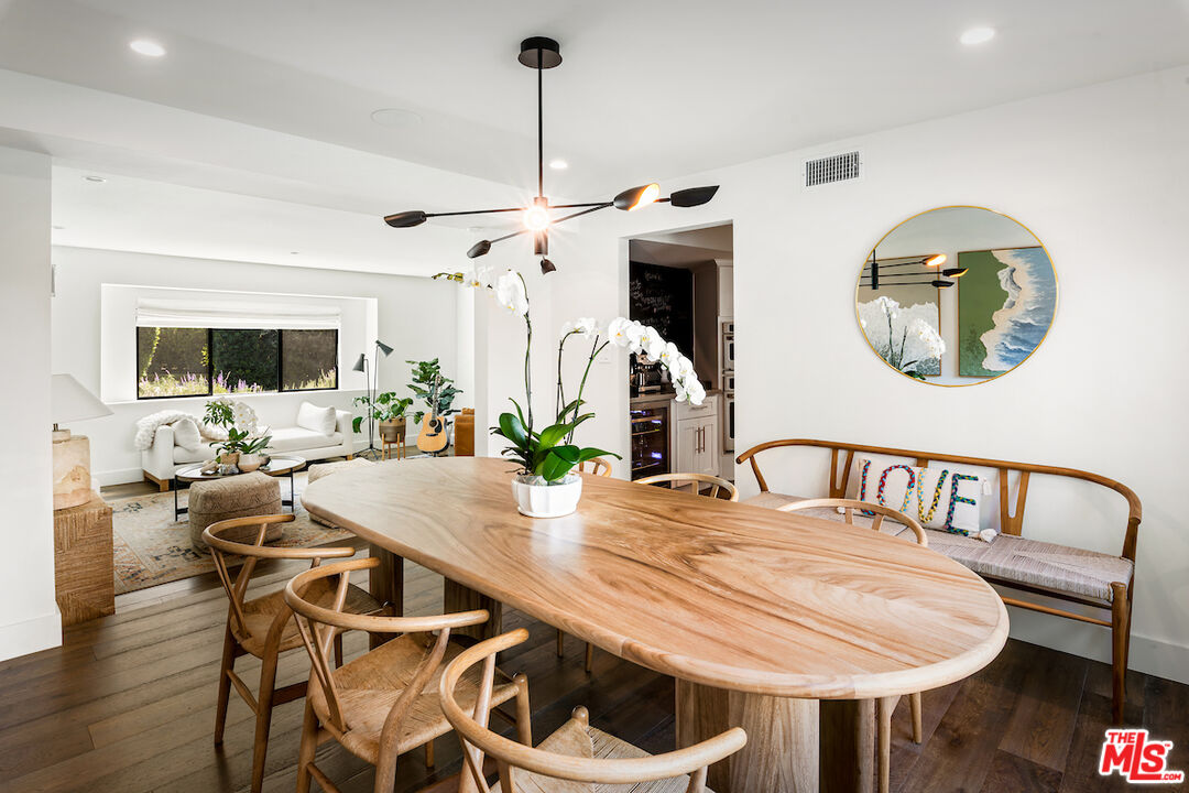 17003 Rancho Street Encino, CA 91316 - Photo 9 of 29 a view of a dining room with furniture