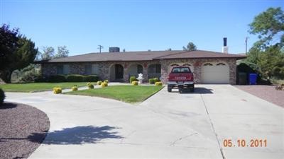 20360 Shoshonee Road Apple Valley, CA 92307 - Photo 1 of 1 a view of a car park in front of house