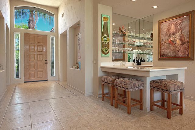 a bedroom with bed and a window