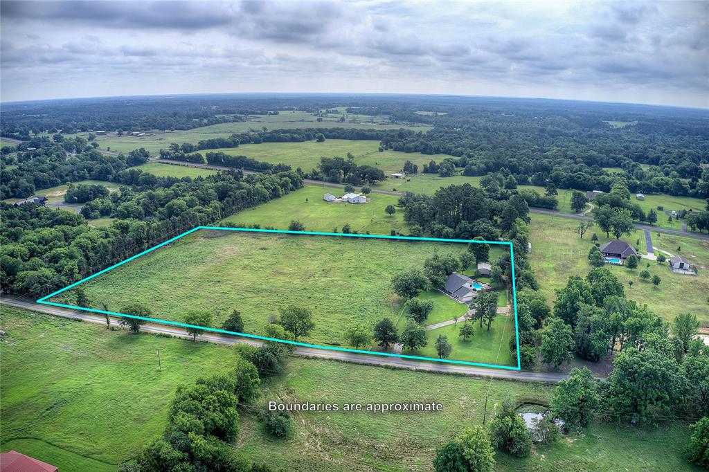 753 County Rd SW 3110 Mount Vernon, TX 75457 - Photo 2 of 40 8.953 gorgeous acres, fenced, with a 4 bedroom house, 30x20 shop, and pool.