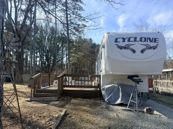 a view of a bench in a back yard