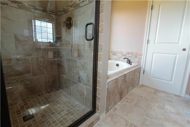 776 Academy Road, Unit 6C Lebanon, TN 37087 - Photo 12 of 16 a bathroom with a bathtub and a shower