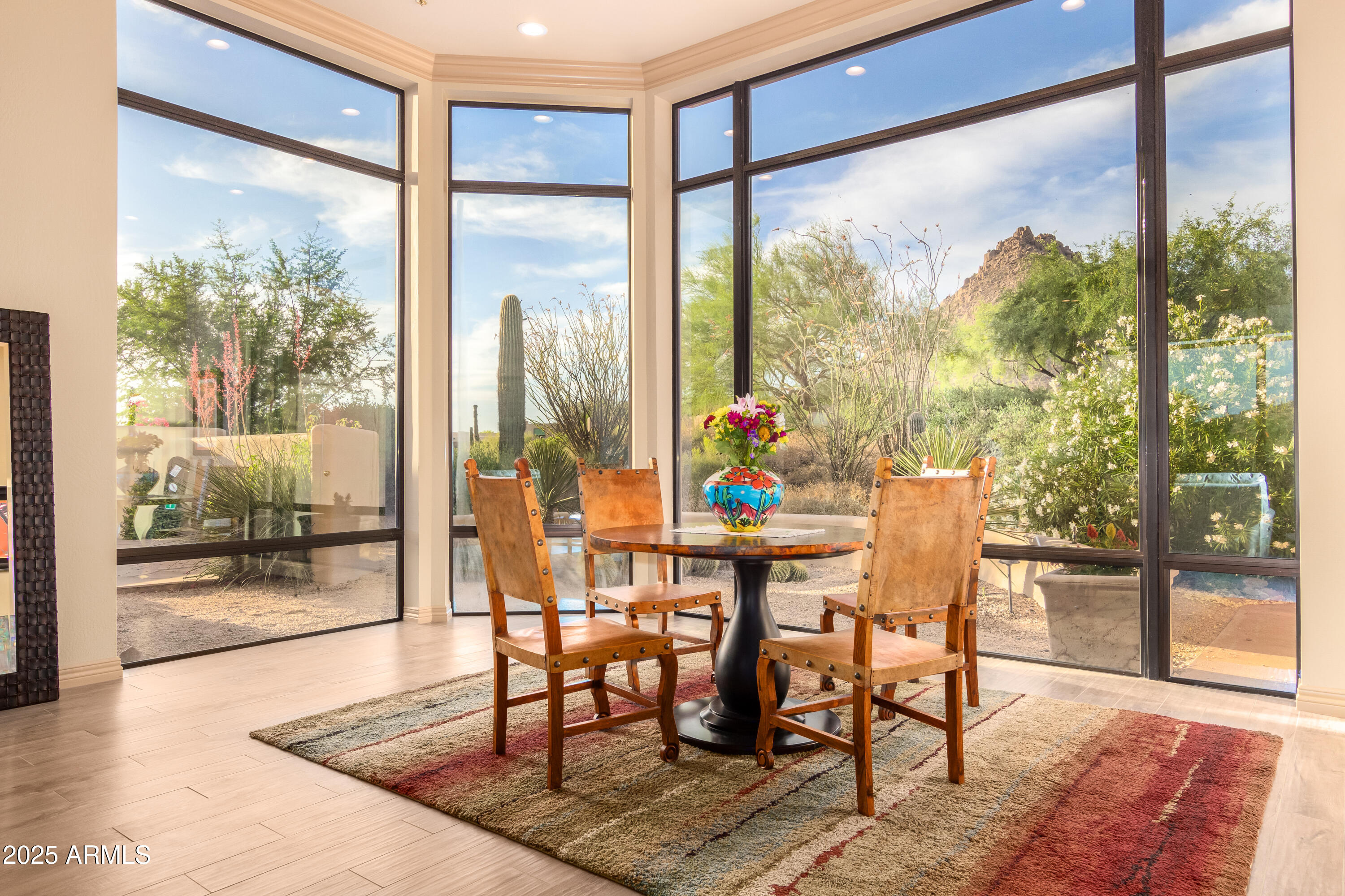 10801 East Happy Valley Road, Unit 133 Scottsdale, AZ 85255 - Photo 14 of 75 a dining room with furniture and glass door