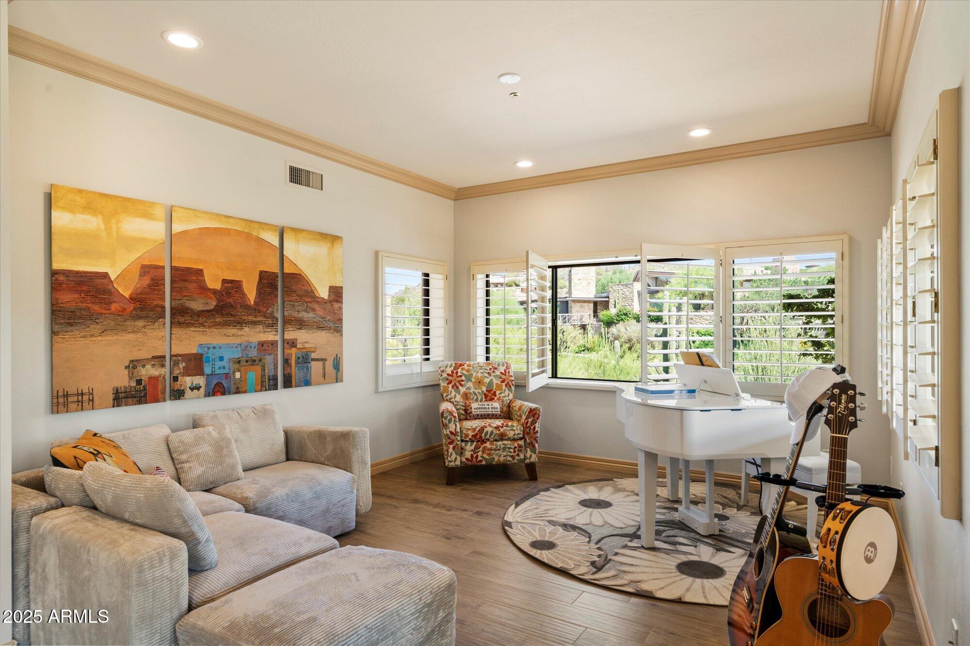10801 East Happy Valley Road, Unit 133 Scottsdale, AZ 85255 - Photo 20 of 75 a living room with furniture and a large window