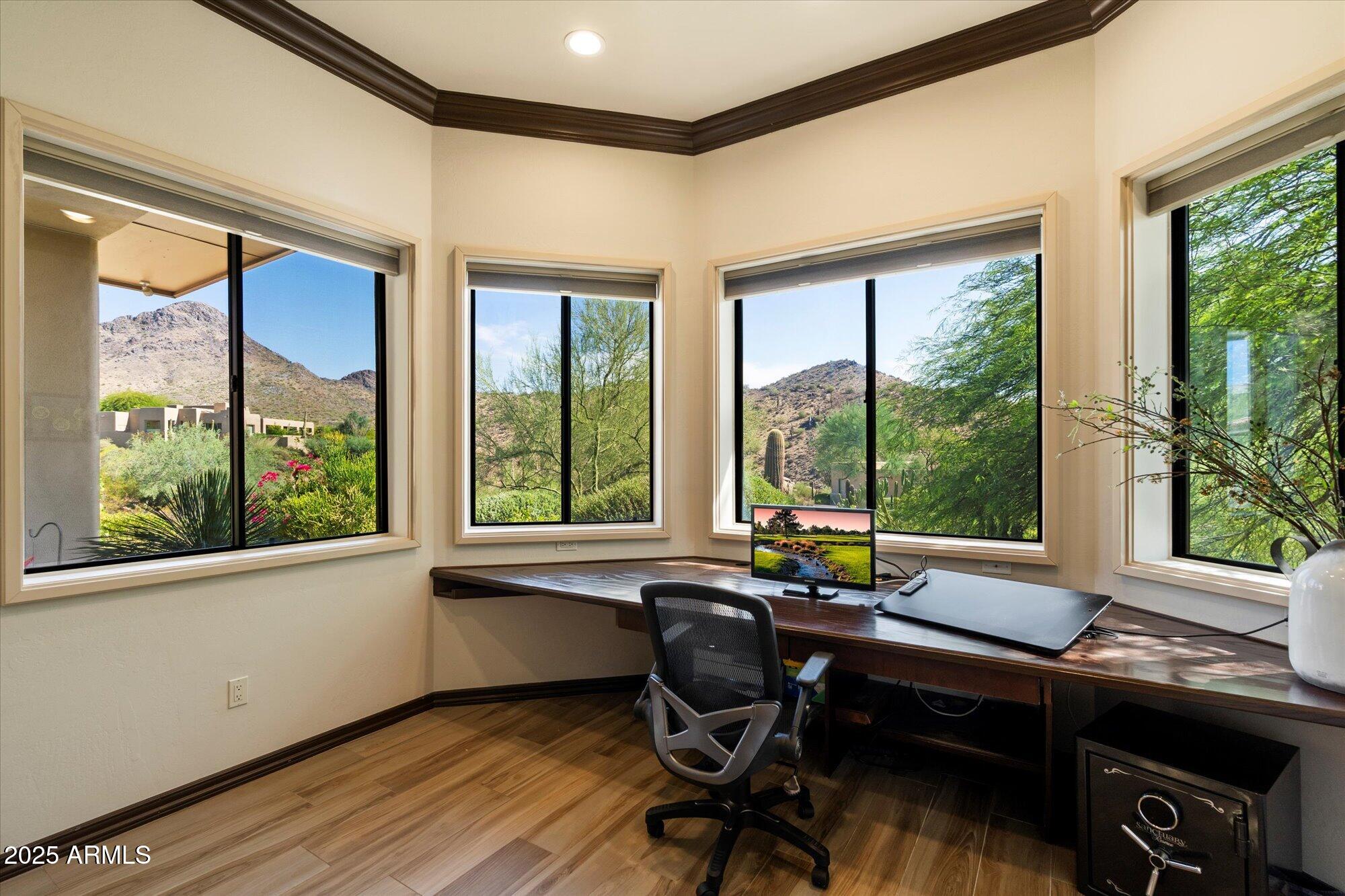 10801 East Happy Valley Road, Unit 133 Scottsdale, AZ 85255 - Photo 26 of 75 a view of a workspace with furniture and a window