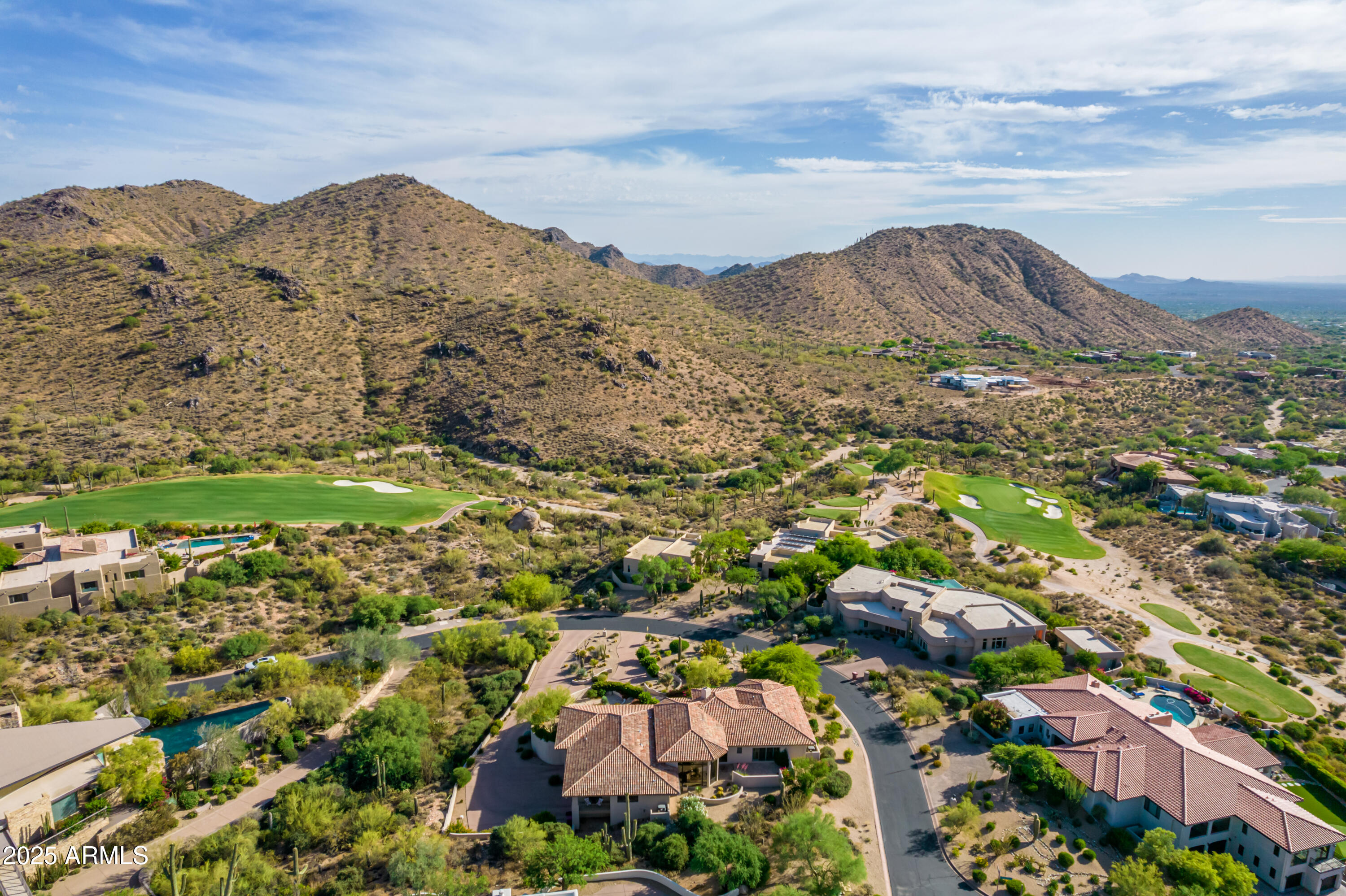 10801 East Happy Valley Road, Unit 133 Scottsdale, AZ 85255 - Photo 3 of 75 an aerial view of residential houses with outdoor space and trees