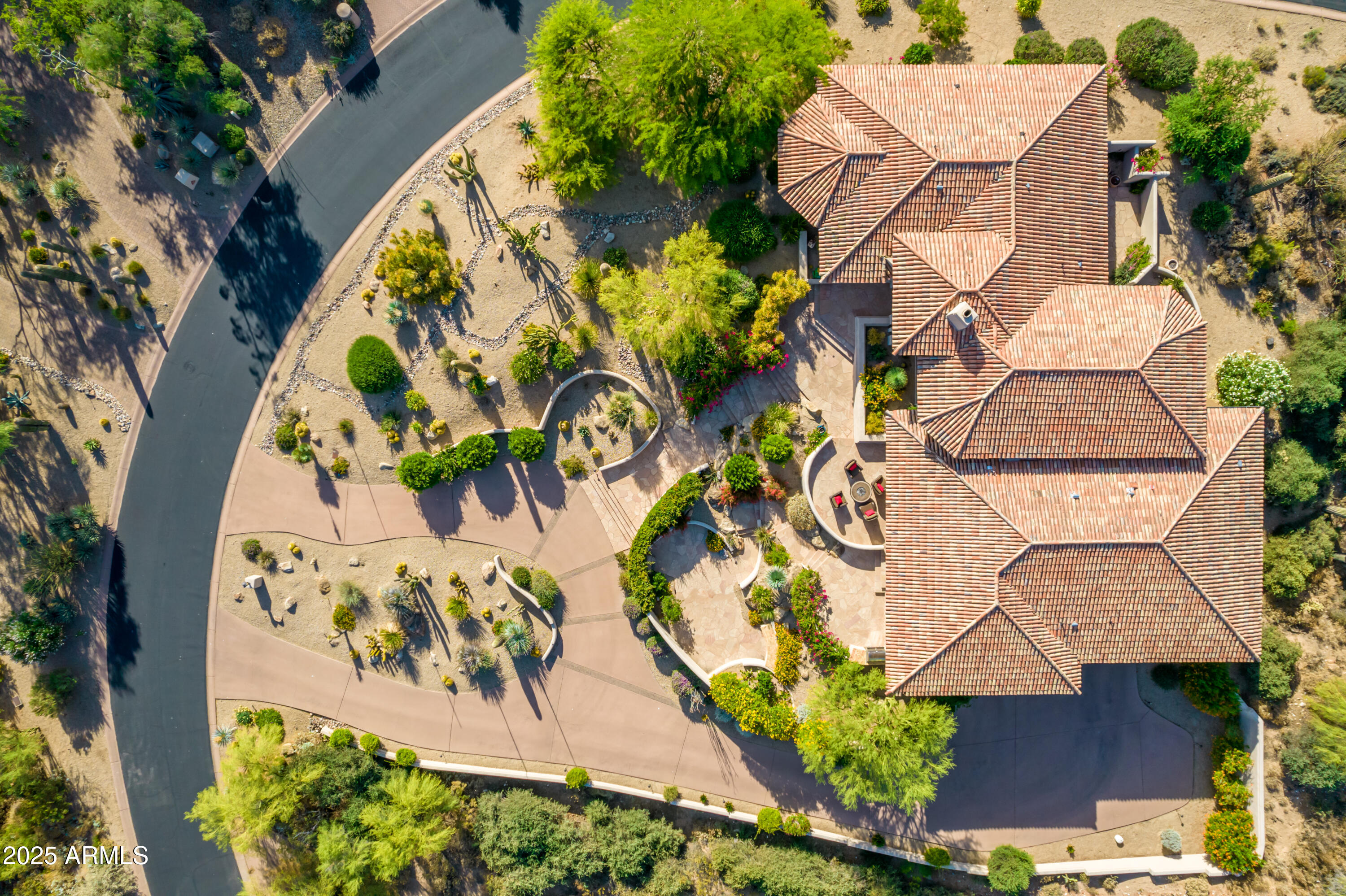 10801 East Happy Valley Road, Unit 133 Scottsdale, AZ 85255 - Photo 4 of 75 an aerial view of a house with a yard and a garden