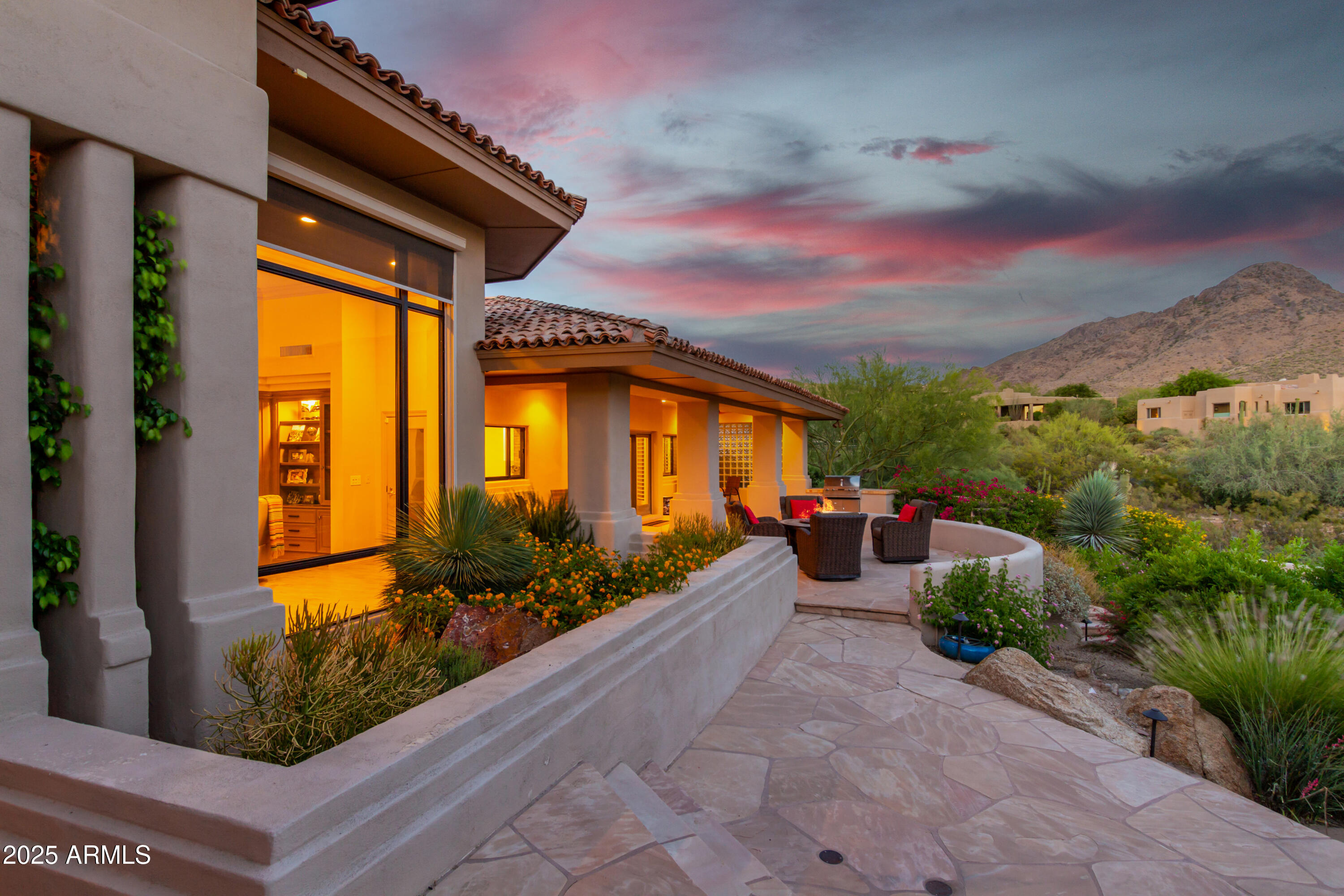 10801 East Happy Valley Road, Unit 133 Scottsdale, AZ 85255 - Photo 54 of 75 a view of a potted plants in front of a house