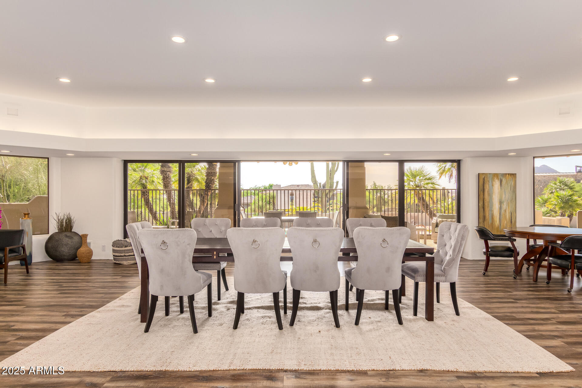 10801 East Happy Valley Road, Unit 133 Scottsdale, AZ 85255 - Photo 70 of 75 a view of a dining room with furniture window and wooden floor