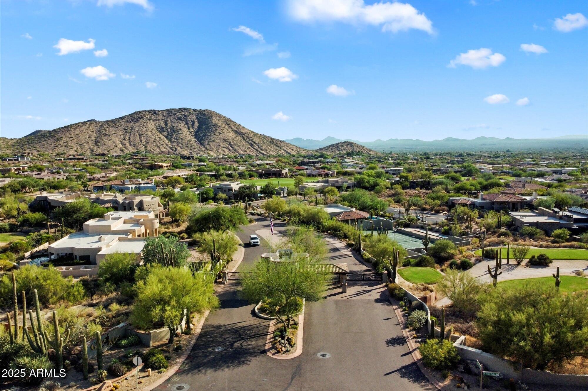 10801 East Happy Valley Road, Unit 133 Scottsdale, AZ 85255 - Photo 73 of 75 an aerial view of residential houses with outdoor space and trees