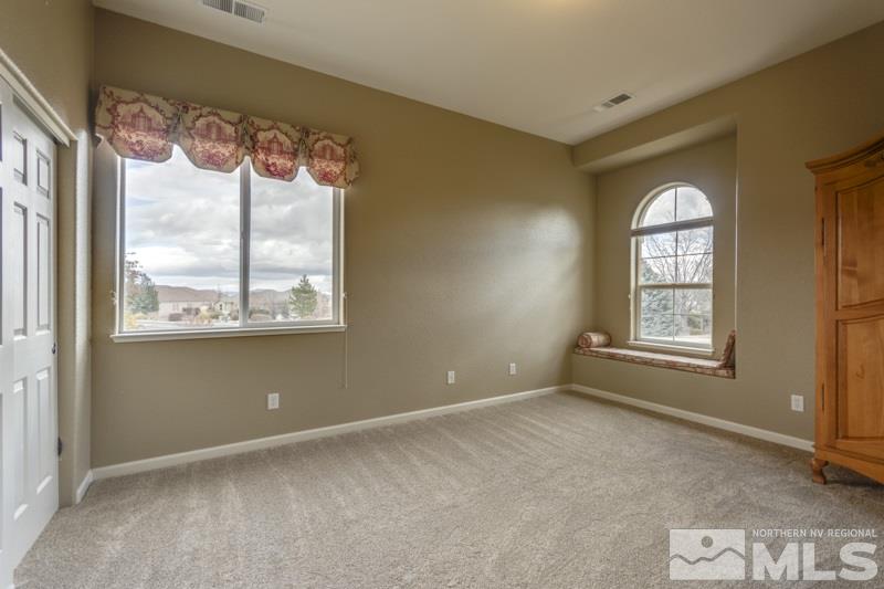 5265 North Elk River Road Reno, NV 89511 - Photo 15 of 25 a view of an empty room with a window