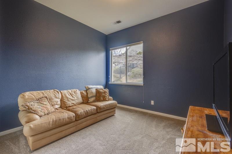 5265 North Elk River Road Reno, NV 89511 - Photo 20 of 25 a living room with a couch