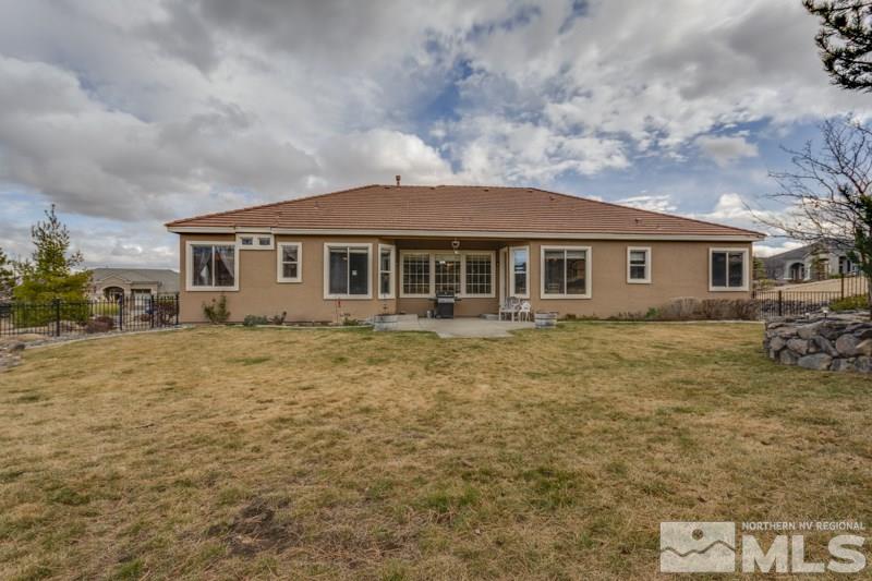 5265 North Elk River Road Reno, NV 89511 - Photo 23 of 25 a front view of a house with a garden