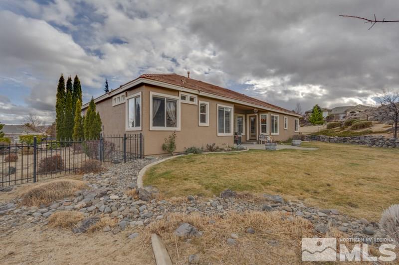 5265 North Elk River Road Reno, NV 89511 - Photo 25 of 25 a house view with swimming pool and sitting space