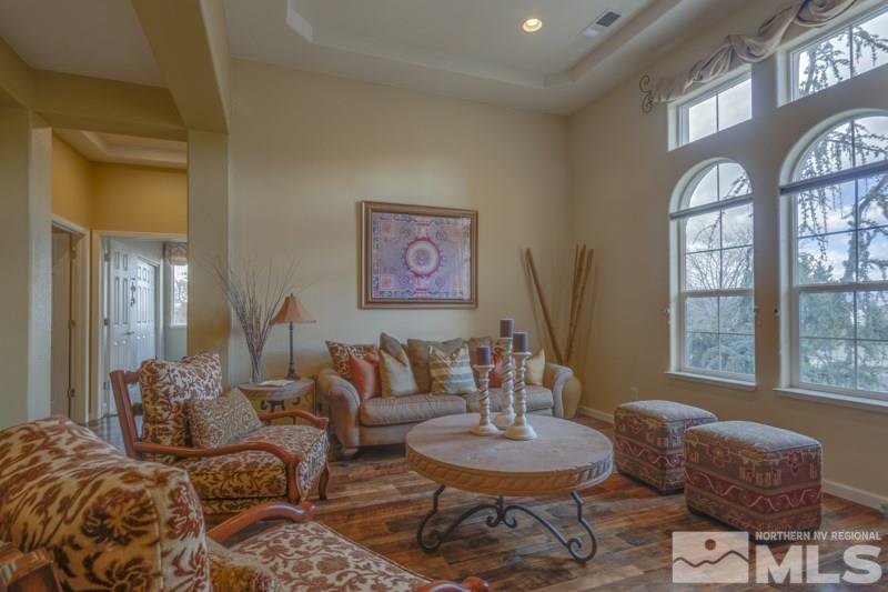5265 North Elk River Road Reno, NV 89511 - Photo 4 of 25 a living room with furniture and a large window