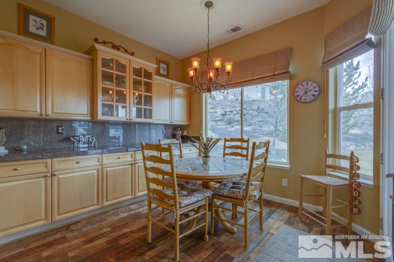 5265 North Elk River Road Reno, NV 89511 - Photo 8 of 25 a view of a dining room with furniture window and outside view