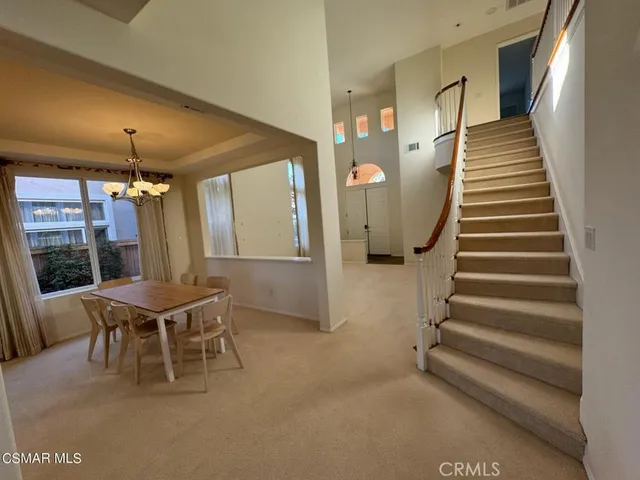 a view of a kitchen from the hallway