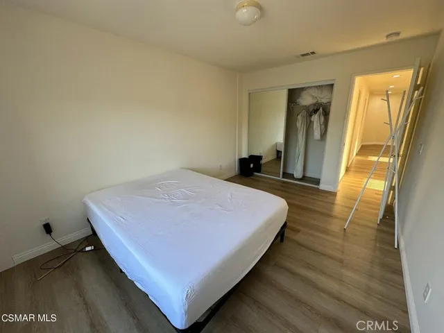 a bathroom with a sink double vanity and a mirror