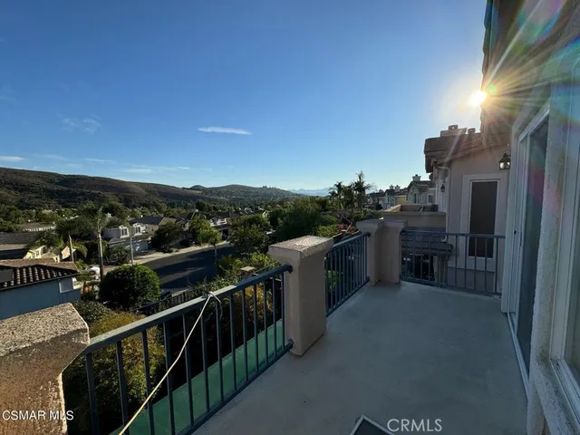 a view of a city from a balcony