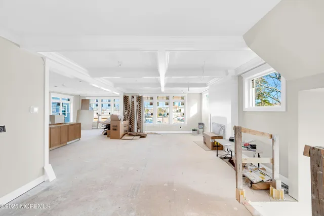 a view of a livingroom with furniture and a livingroom