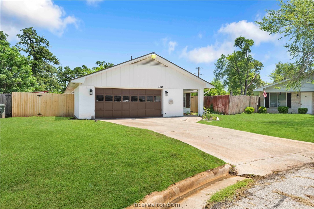 4403 Robinhood Circle Bryan, TX 77803 - Photo 2 of 19 a view of a house with a yard