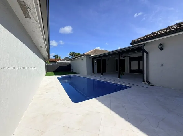 a view of a house with entertaining space