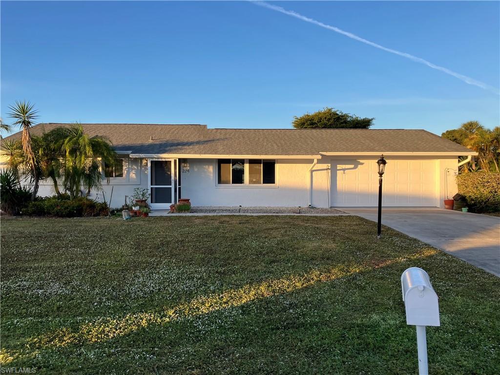 a house view with a garden space