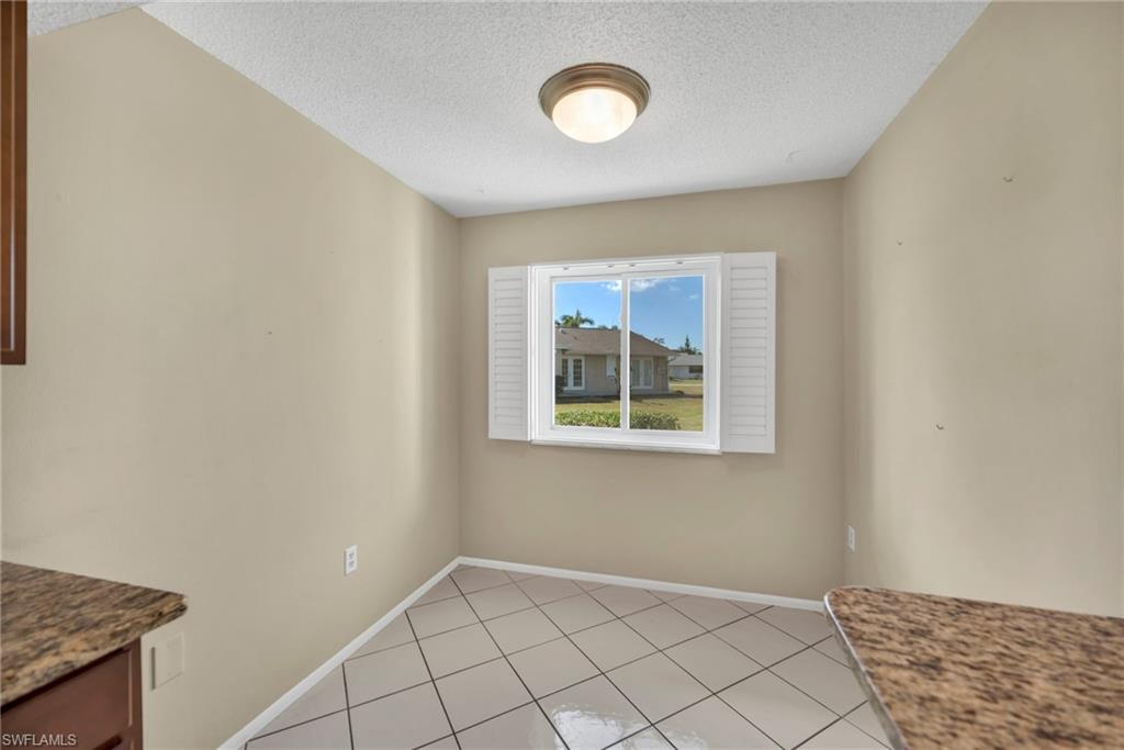 224 Potomac Place Naples, FL 34112 - Photo 11 of 17 an empty room with windows