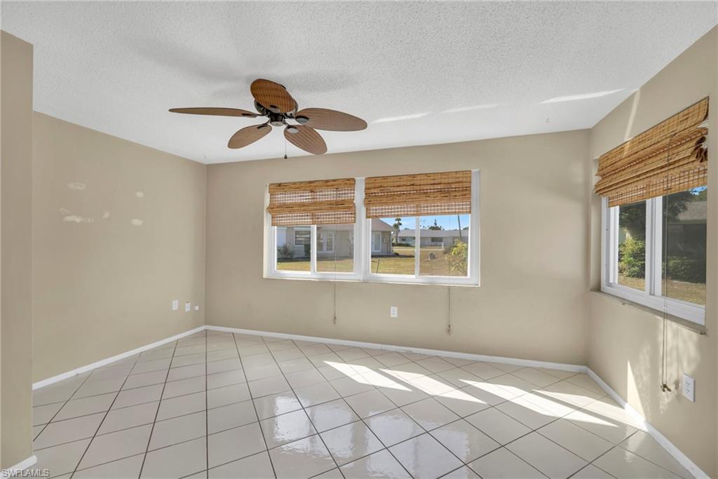 224 Potomac Place Naples, FL 34112 - Photo 15 of 17 a view of an empty room with a window