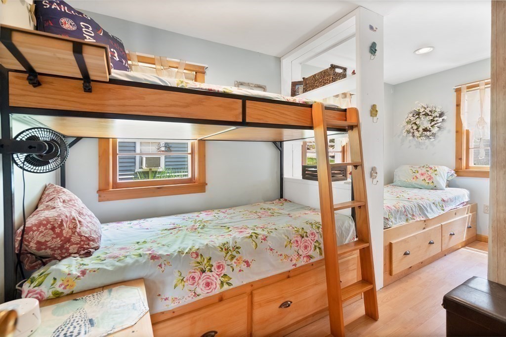 40 Over The Top Road Holland, MA 01521 - Photo 18 of 41 a bedroom with a bed and wooden floor