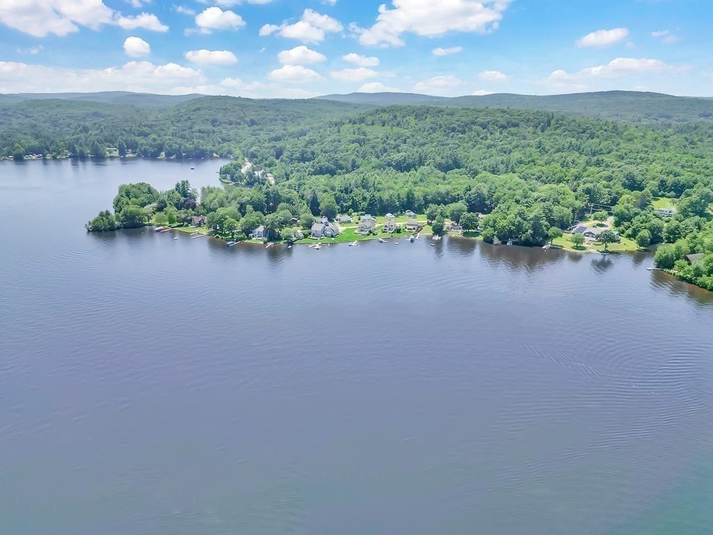 40 Over The Top Road Holland, MA 01521 - Photo 2 of 41 a view of a lake with houses in the back