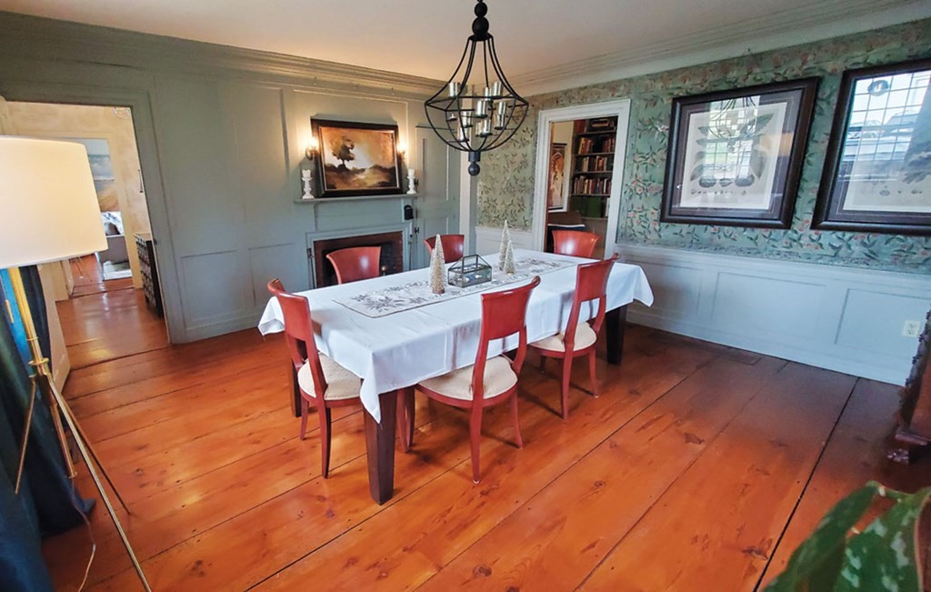 8 George Hill Road Grafton, MA 01519 - Photo 8 of 35 a dining room with wooden floor a chandelier a wooden table and chairs