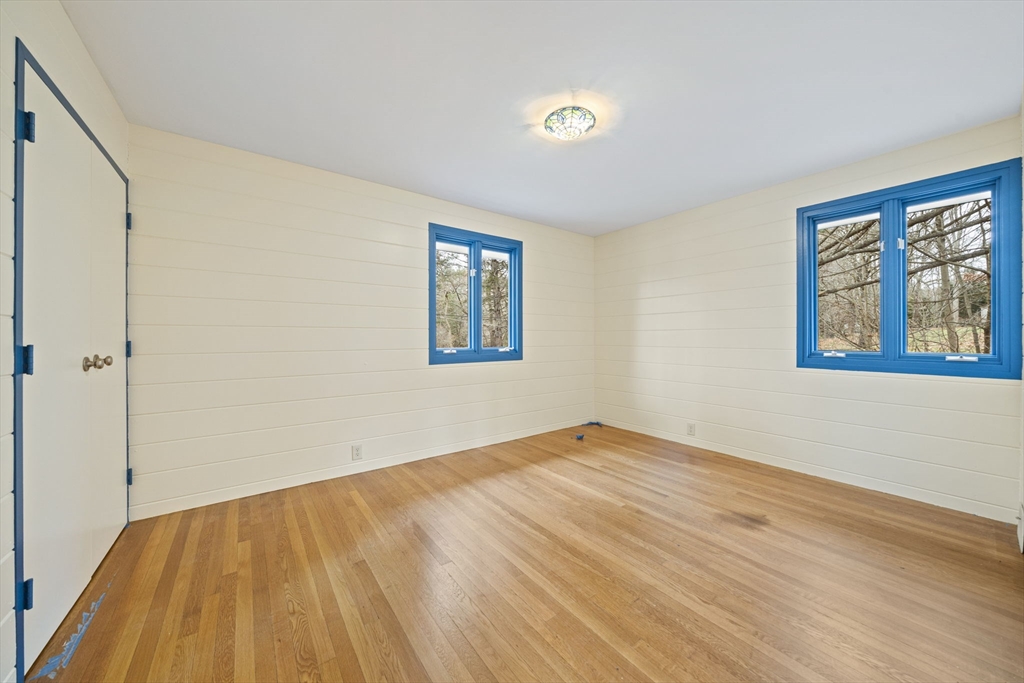 12 Sabrina Farm Wellesley, MA 02482 - Photo 11 of 16 a view of empty room with wooden floor and fan