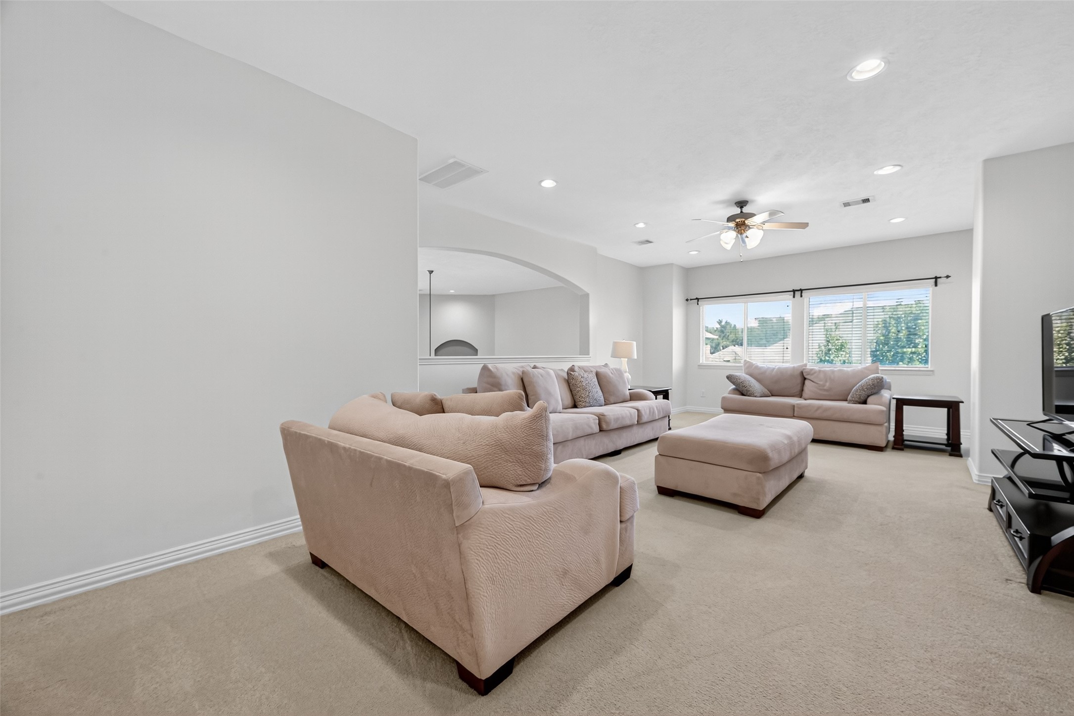 24914 Hazel Ranch Drive Katy, TX 77494 - Photo 14 of 45 a living room with furniture and a couch