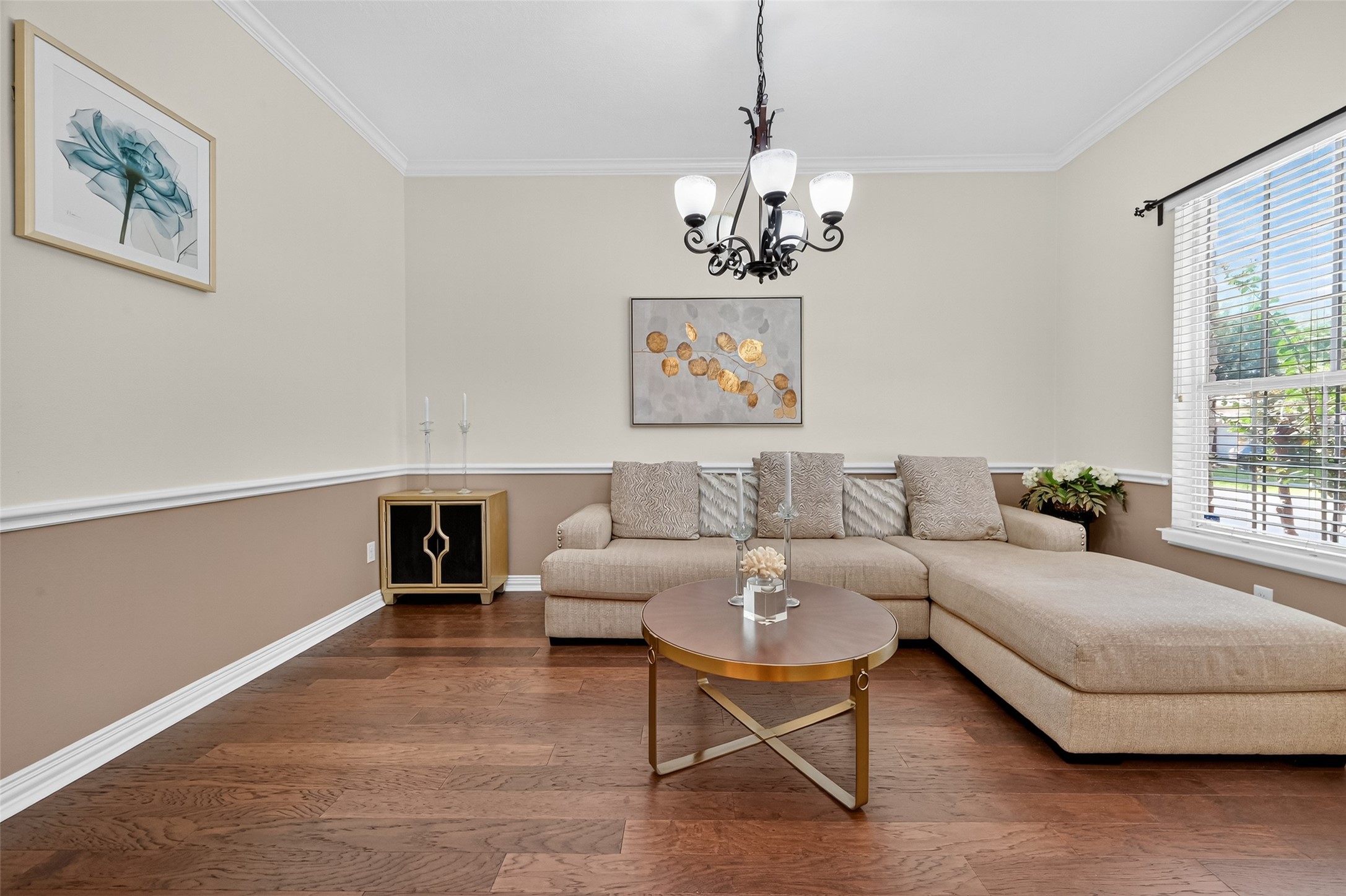 24914 Hazel Ranch Drive Katy, TX 77494 - Photo 15 of 45 a living room with furniture and a chandelier